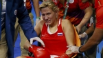 23-летняя российская спортсменка Белякова завоевала медаль, покинув ринг в инвалидной коляске 