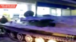 Пьяный мужчина на бронетранспортере въехал в витрину магазина, а потом пошёл за покупками
