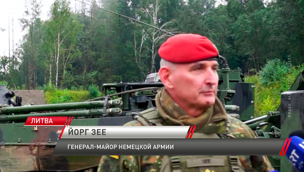 НАТО перебрасывает военных и бронетехнику в Литву-4